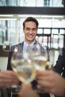 Businesspeople toasting glasses of champagne