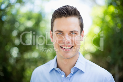 Portrait of man in park