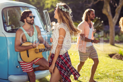 Group of friends having fun in music festival