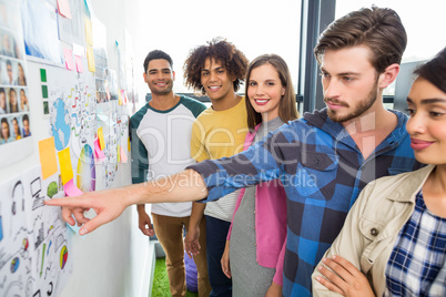 Graphic designers reading documents