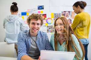 Portrait of executive with digital tablet in office