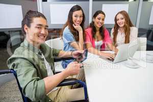 Portrait of smiling executives in conference room