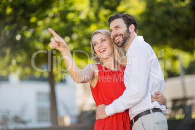 Woman pointing at a distance