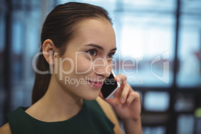 Businesswoman talking on mobile phone