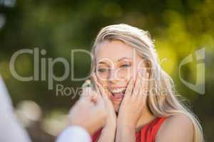 Woman surprised after seeing the ring