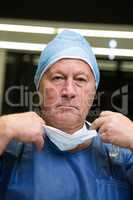 Portrait of male surgeon wearing surgical mask