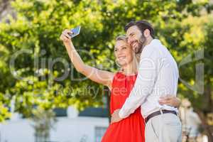 Happy couple taking a selfie