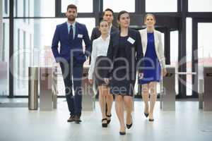 Businesspeople walking in a lobby