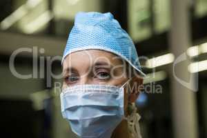 Portrait of female surgeon wearing surgical mask