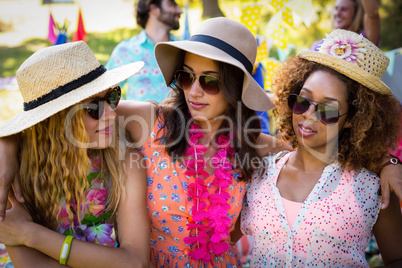 Group of friends standing together in park