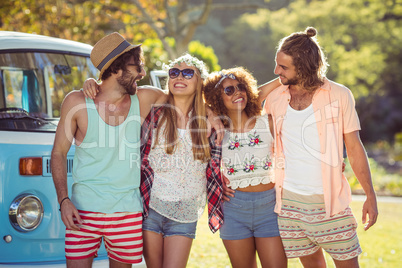 Group of friends standing together in park