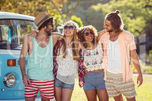 Group of friends standing together in park