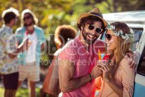 Couple enjoying and eating ice lolly