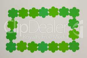 St Patricks Day shamrocks forming rectangle frame