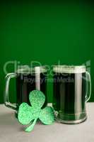 Mug of green beer and shamrock for St Patricks Day