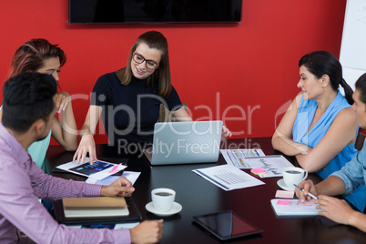 Business executives discussing during meeting