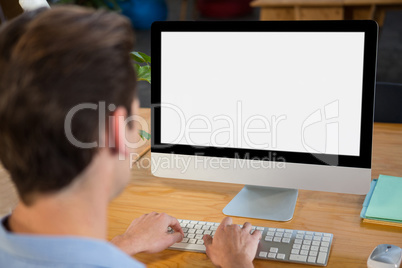 Graphic designer using desktop pc