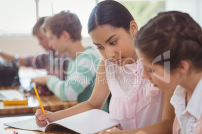 Two students studying in classroom