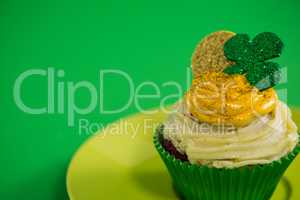 St Patricks Day shamrock on the cupcake kept in plate