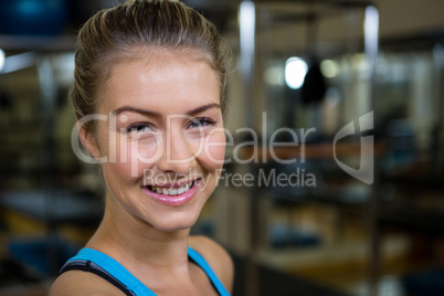 Portrait of smiling fit woman