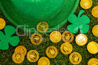 St. Patricks Day leprechaun hat, shamrocks and chocolate gold coins