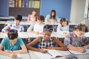 Students studying in classroom