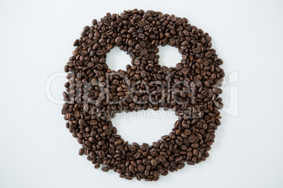 Coffee beans forming smiley face