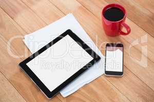 Coffee with digital tablet and mobile phone