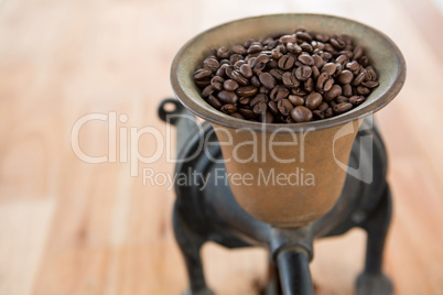 Coffee grinder with coffee beans inside