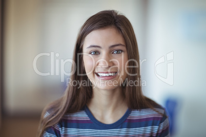 Portrait of smiling schoolgirl