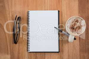 Coffee with organizer and mobile phone