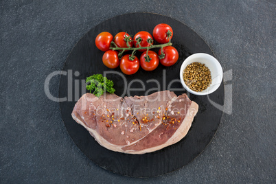 Sirloin chop, cherry tomatoes and coriander seeds