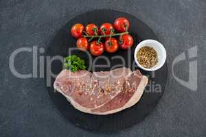 Sirloin chop, cherry tomatoes and coriander seeds