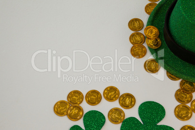 St. Patricks Day leprechaun hat, shamrocks and chocolate gold coins