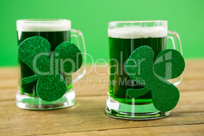 St Patricks Day two mugs of green beer with shamrock