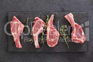 Rib chop and herb on black slate plate