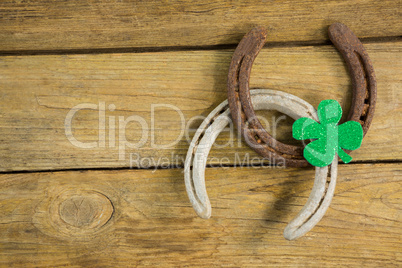 St Patricks Day shamrock with two horseshoes