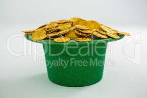 St. Patricks Day leprechaun hat filled with chocolate gold coins