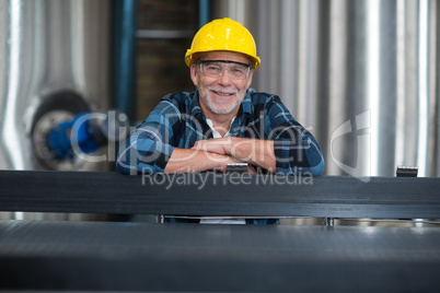 Male factory worker at drinks production factory