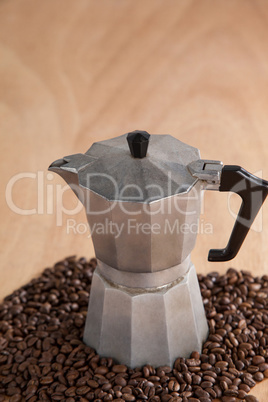 Metallic coffee maker with coffee beans