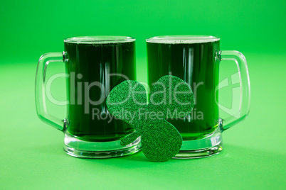 St Patricks Day two mugs of green beer with shamrock