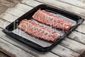 Beef ribs in black box