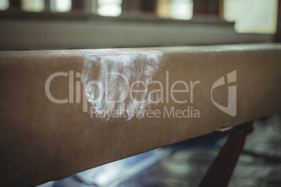 Chalk powder stain on balance beam