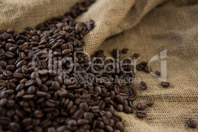 Roasted coffee beans on sack