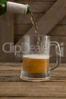 Beer being poured into a mug