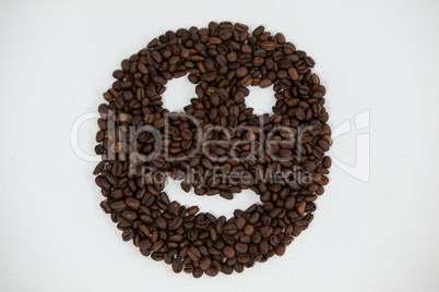 Coffee beans forming smiley face