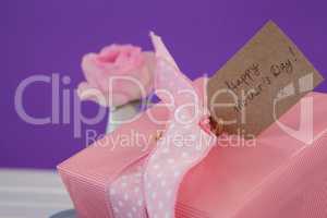 Close-up of happy mothers day card with gift box