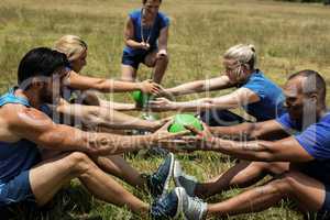 Fit people performing core exercise