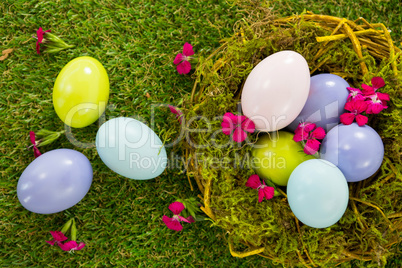 Multicolored Easter eggs in the nest