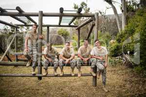 Soldiers sitting on the obstacle course in boot camp